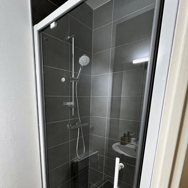 Shower room with a shower and washbasin
