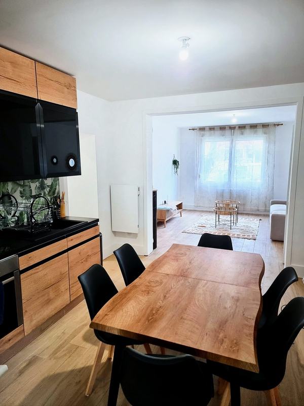 Open kitchen and dining area leading to the living room